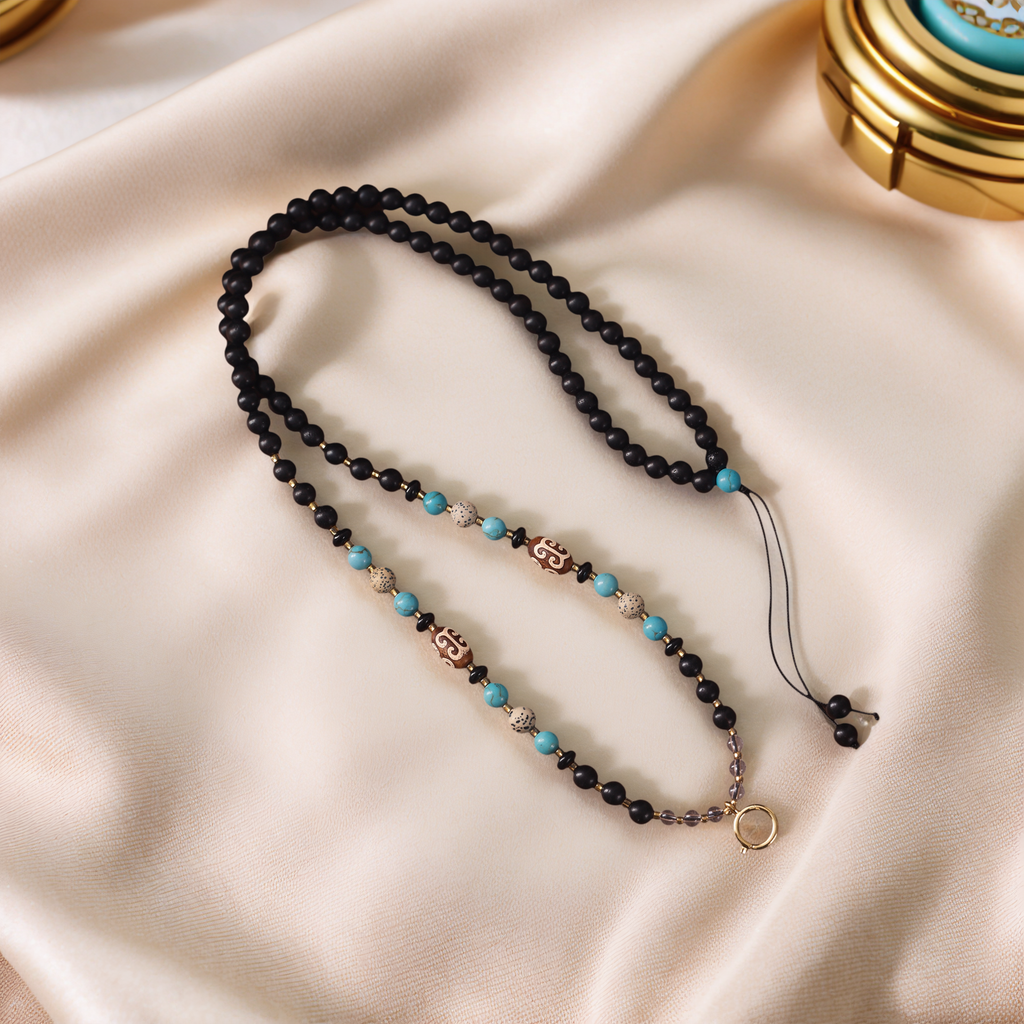 Natural Ebony & Beeswax Amber Pendant Chain — lifestyle view
