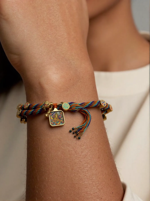 Amitabha Buddha — Hand-Painted Gilded Thangka Charm Bracelet (2D) — lifestyle view