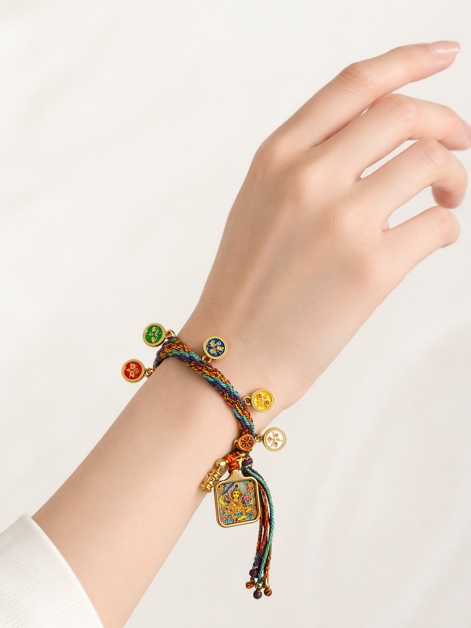 Wuye Guardian — Hand-Painted Gilded Thangka Charm Bracelet (2D) — lifestyle view