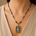 Eastern Luck Four-Armed Avalokiteshvara Deluxe 3D relief Tsatsa pendant — lapis bead necklace worn — image 8 of 10
