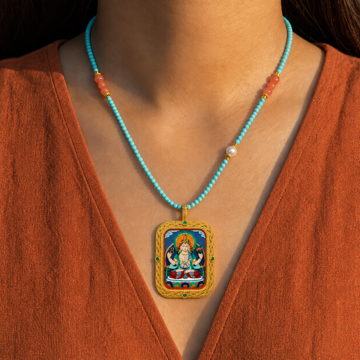 Eastern Luck Four-Armed Avalokiteshvara Deluxe 3D relief Tsatsa pendant — turquoise coral bead necklace worn — image 9 of 10