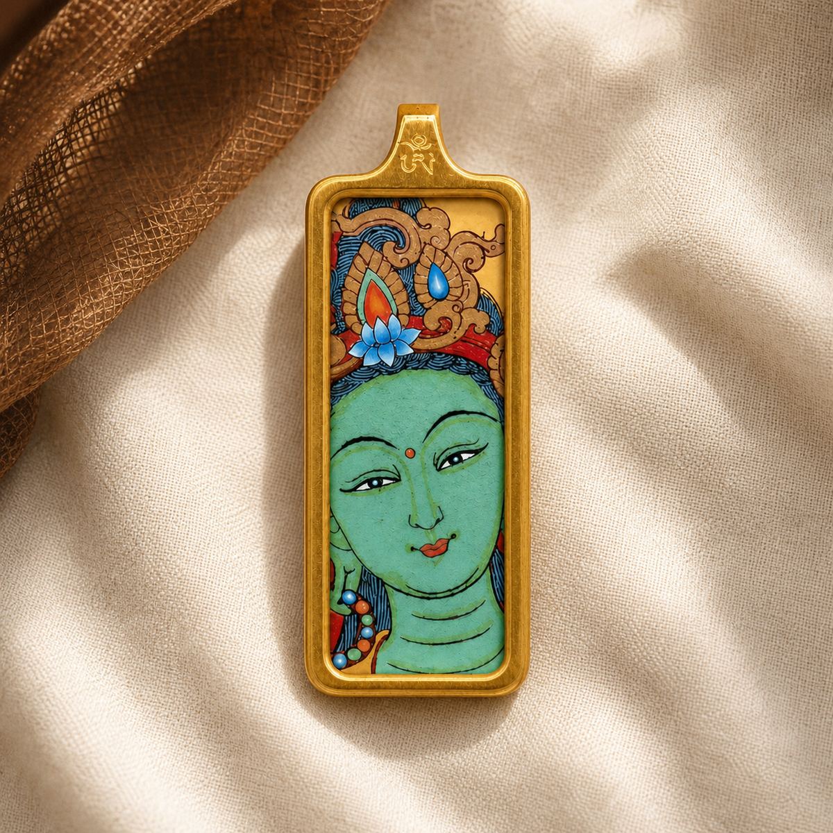 Eastern Luck Green Tara mini Tibetan thangka pendant — ivory linen still life — image 5 of 10